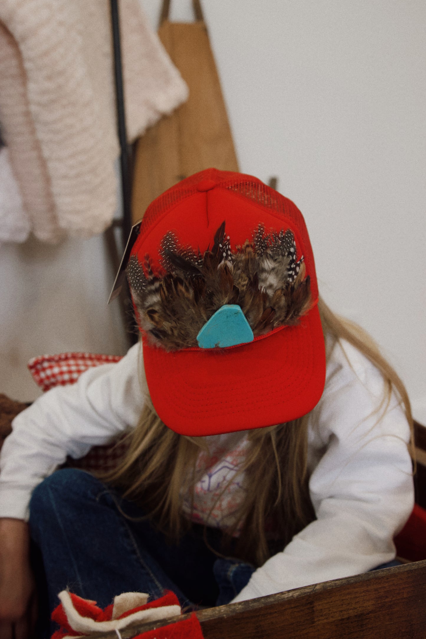 “Wild About You” Red Feather Crest Trucker Hat